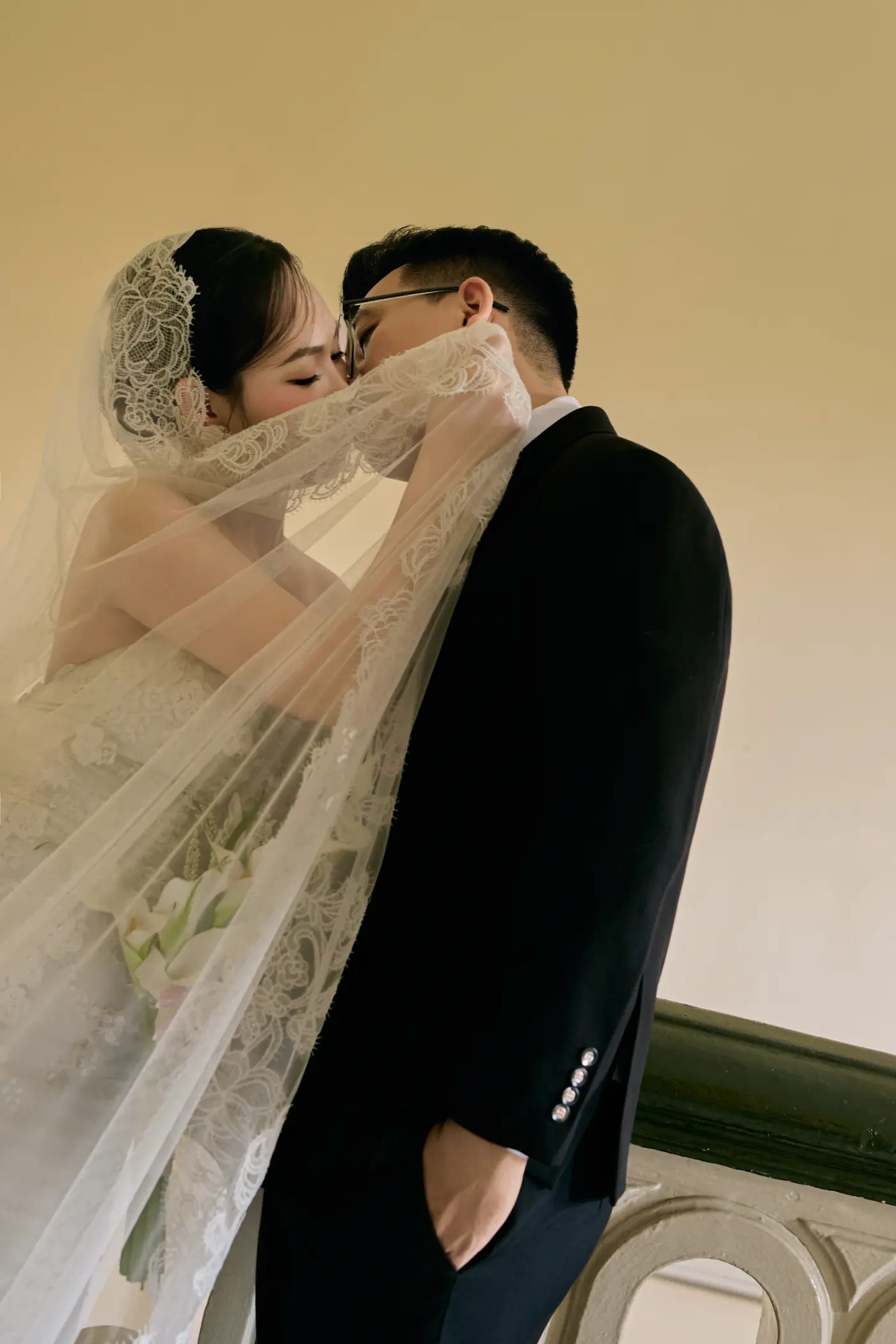 A kiss through the veil